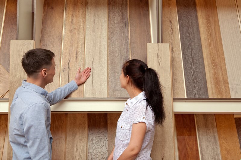 couple shopping for in-store flooring products