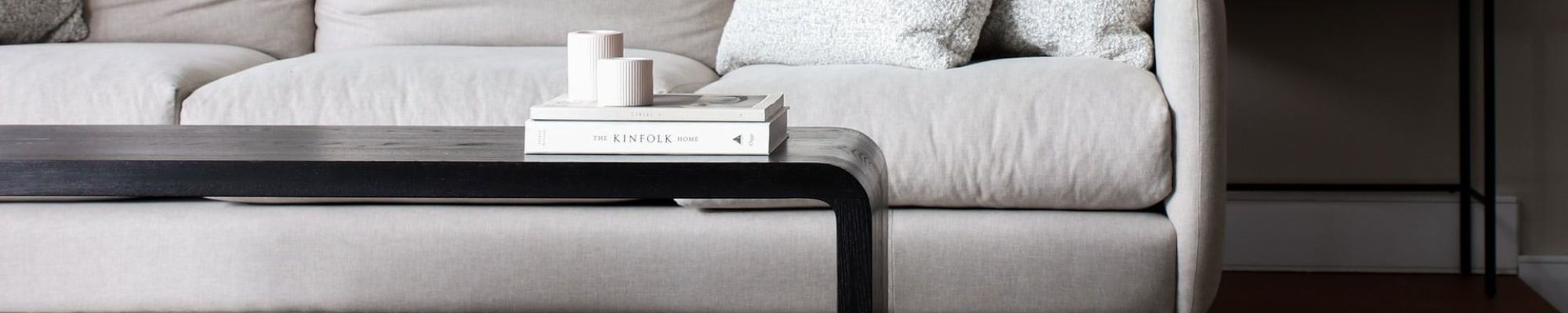 white couch and black coffee table on a brown hardwood floor from Mendel Carpet & Flooring in Indianapolis, IN